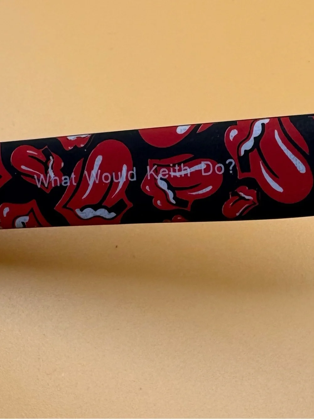 Rolling Stone Sunglasses with Red Patterned Temples with matching pouch
